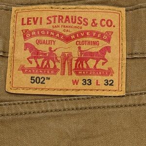 MENS LEVIS KHAKI 502 SZ 33/32